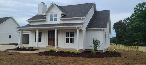 Freshly painted modern farmhouse in Cullman: what homeowners and landlords should budget for exterior painting in 2025. Schedule your estimate today.