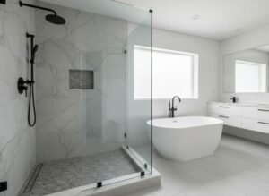 Client-inspired tile shower and freestanding tub with marble-look wall tile and black fixtures, Cullman AL